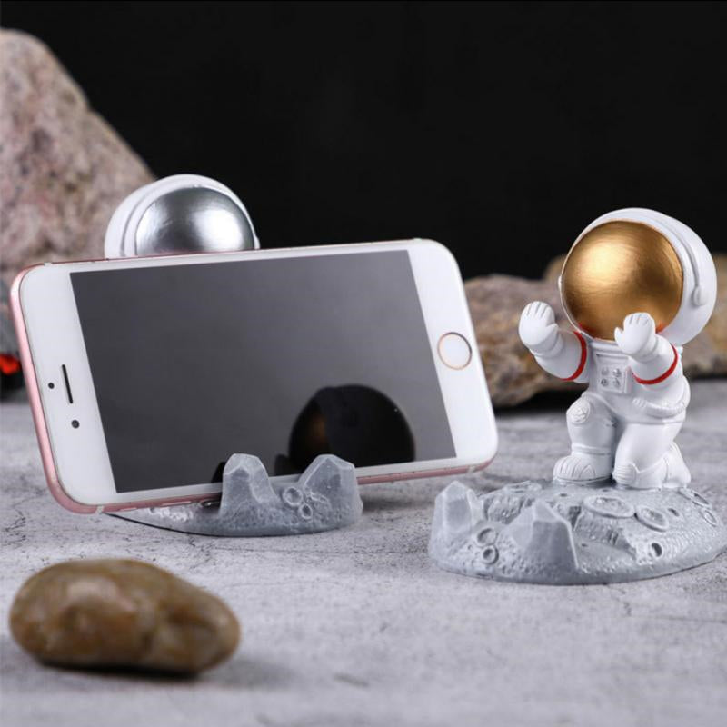 Astronaut phone holder