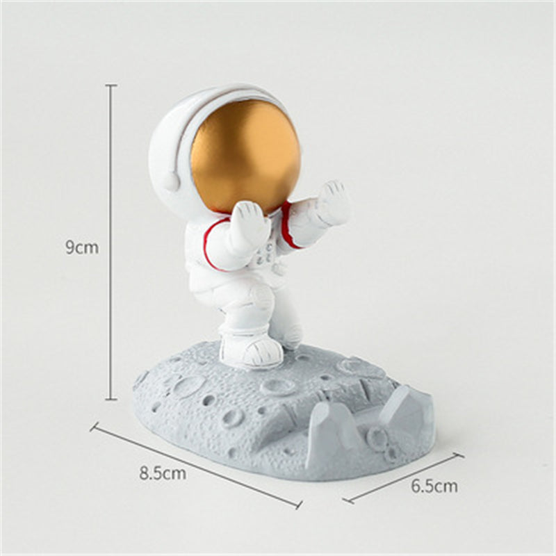 Astronaut phone holder