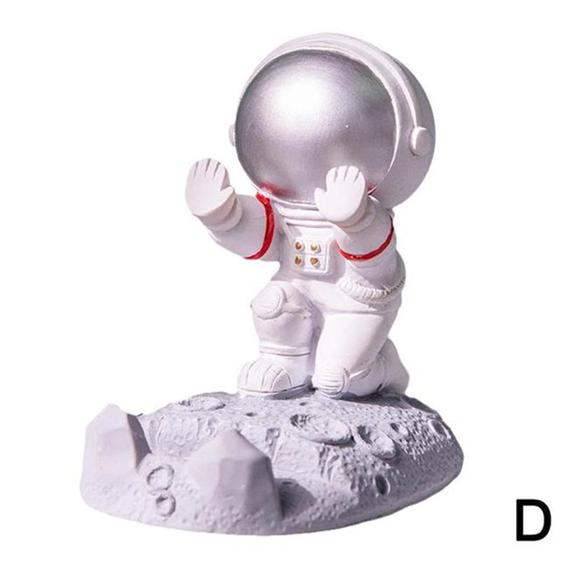 Astronaut phone holder